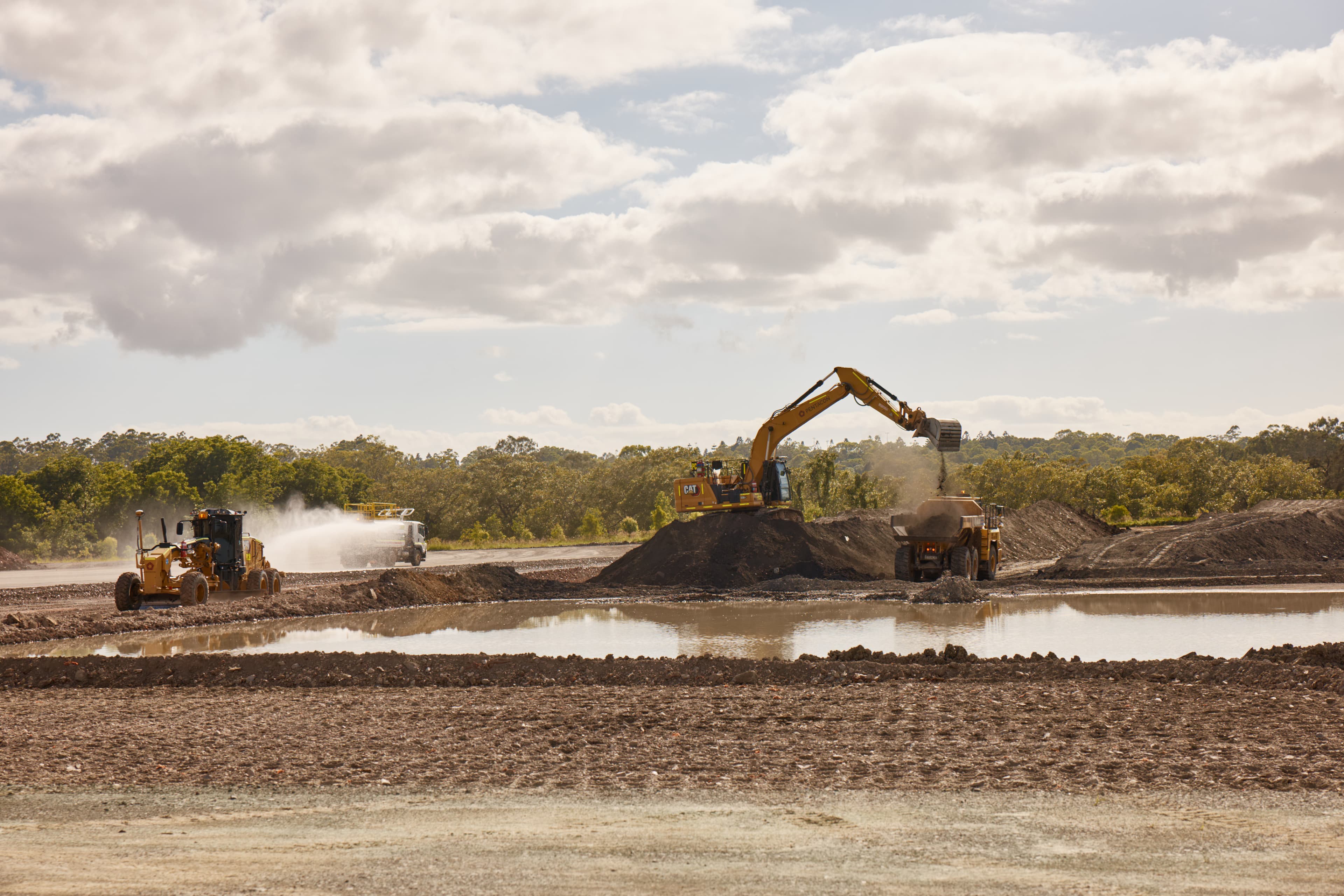 Trucks and machinery at Moreton Bay Indoor Spot centre