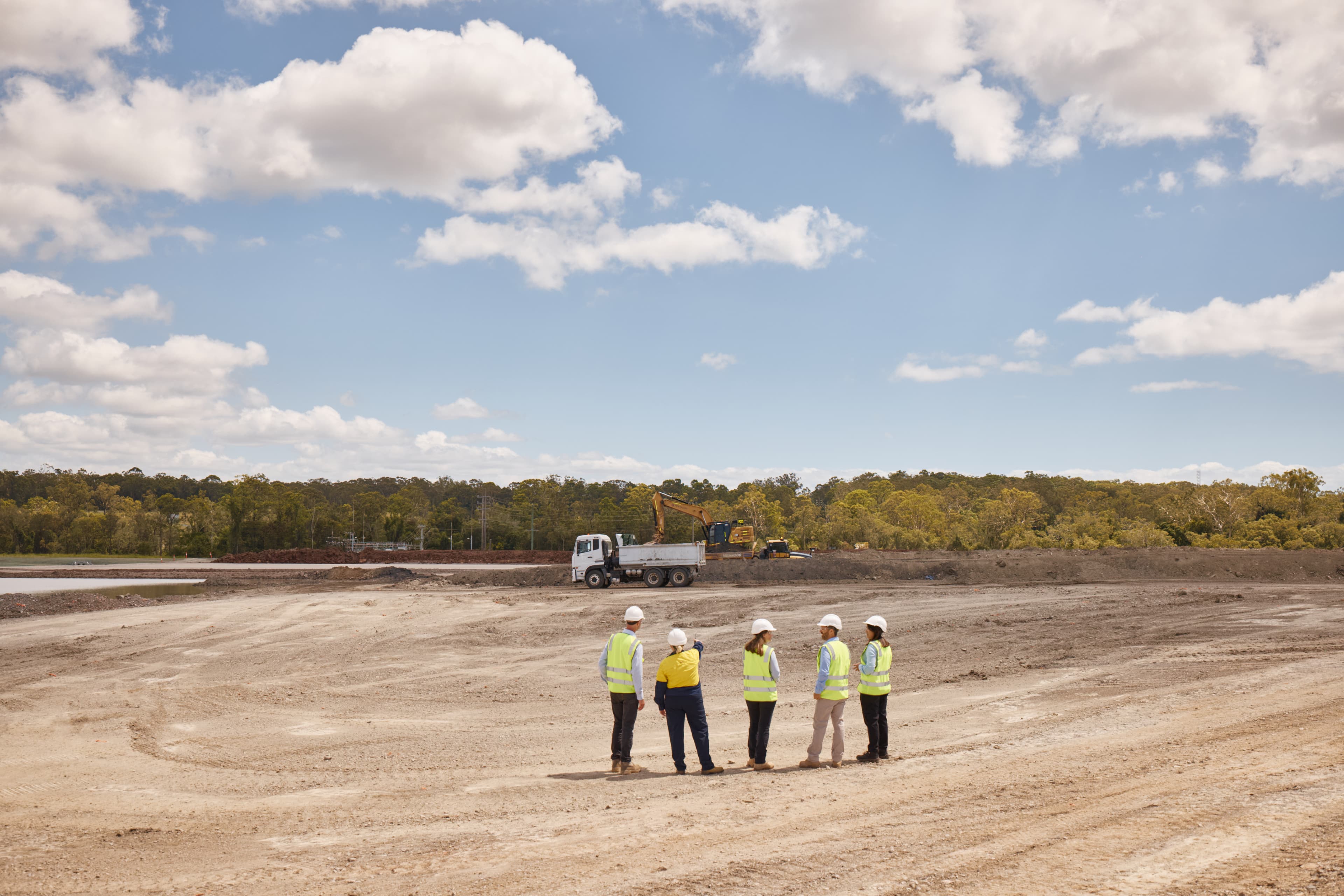 5 people at the Moreton Bay Indoor Sport Centre construction site (Procurement tile homepage)