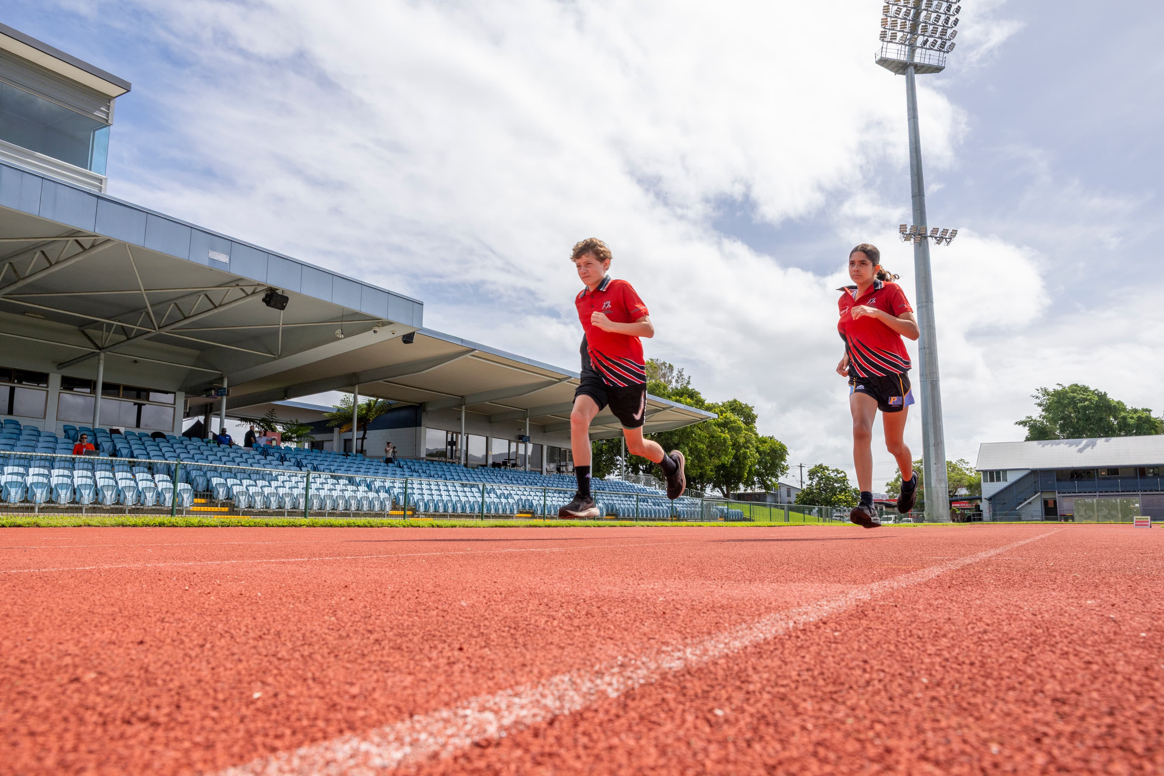 Kids running on the synthetic track at Barlow Park Stadium